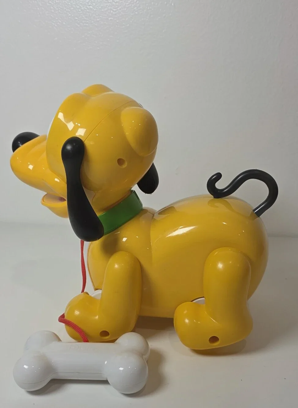 Disney's Animated Pluto pull toy With Bone- Barks and musical